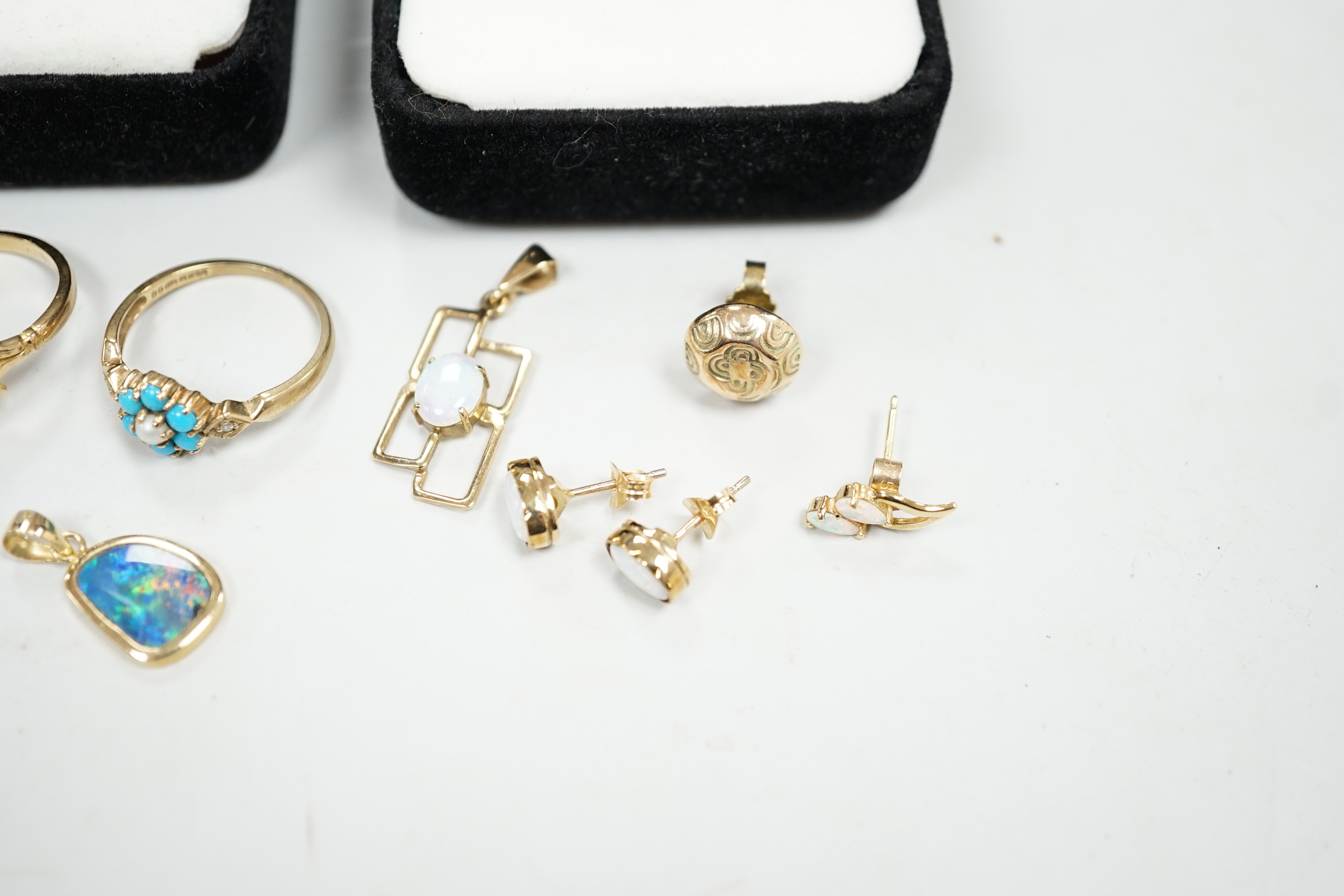 Four assorted modern 9ct gold and gem set rings including two white opal, gross weight 9.4 grams, two pairs of modern 9ct gold and gem set ear studs and other minor jewellery.